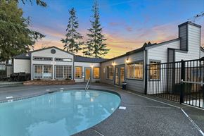 Lynnwood apartment for rent - Novela Apartment Homes Pool Area and Clubhouse at Dusk
