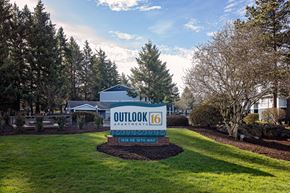 Gresham apartment for rent - a sign that says outlook 16 with a house and trees in the background
