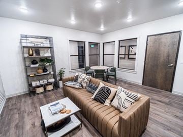 Meridian apartment for rent - a living room with a couch and a table