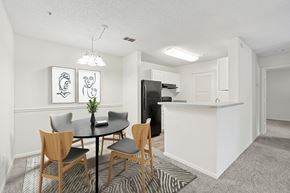 Austell apartment for rent - A dining room with a table and chairs.