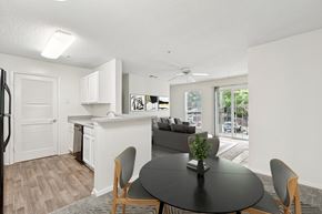 Austell apartment for rent - A modern kitchen with a dining table and chairs.
