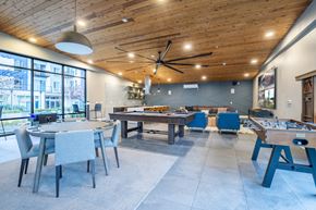 Shoreline apartment for rent - Paceline Apartments game room with a pool table and foosball