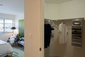 Bellevue apartment for rent - A white bedroom with a white bed and a white chair.