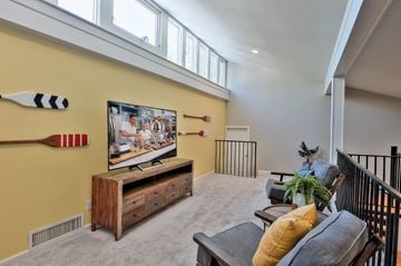 Reno apartment for rent - a living room with a couch and a tv
