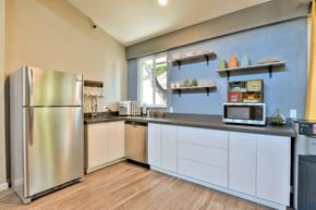 Reno apartment for rent - Park at Idlewild Apartments kitchen with white cabinets and a stainless steel refrigerator
