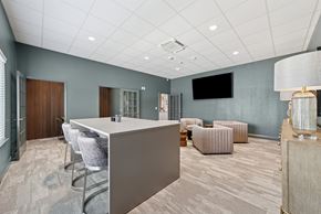 Longview apartment for rent - A conference room with a long table and chairs.