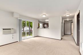 Moses Lake apartment for rent - Pioneer Meadows Living Room with Private Patio