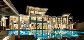 Bluffdale apartment for rent - Rockpoint Apartments Pool Area and Building at Night
