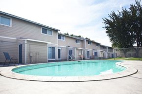 Kennewick apartment for rent - Sage Creek Exterior Buildings & Swimming Pool