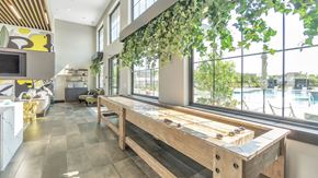 Fishers apartment for rent - Slate at Fishers District Modern Villas and Townhomes in Fishers, Indiana Clubhouse Lounge with Games