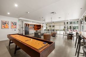 Bellevue apartment for rent - A pool table is in the middle of the room.
