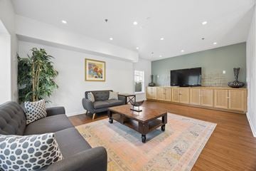 Gresham apartment for rent - A living room with a grey couch and a wooden coffee table.