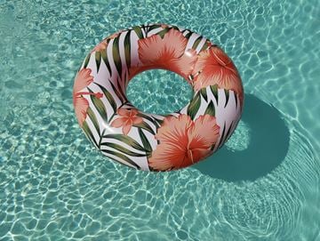 Irvine apartment for rent - A floral patterned ring float in a pool.
