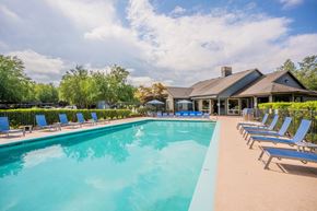 Tualatin apartment for rent - Stonesthrow Apartments Pool with Lounge Chairs