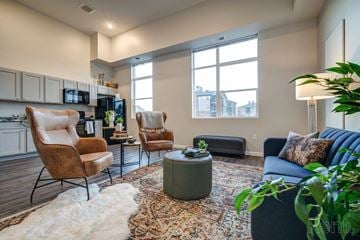 Bozeman apartment for rent - a living room with a couch and chairs and a window
