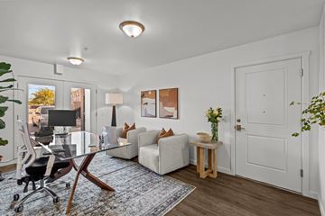 Richland apartment for rent - a living room with a couch and a desk