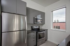 Portland apartment for rent - The Bridgetown Apartment Gray Kitchen Cabinets