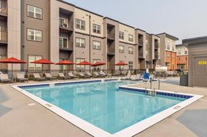 Bozeman apartment for rent - The Edison at Bozeman Gateway Apartments in Bozeman, Montana Pool with Lounge Chairs