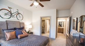 Manor apartment for rent - The Flats at Shadowglen Apartments in Manor, TX Model Bedroom with Attached Bathroom