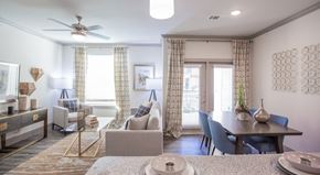 Manor apartment for rent - The Flats at Shadowglen Apartments in Manor, TX Model Kitchen and Living Room