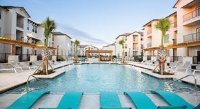 Manor apartment for rent - The Flats at Shadowglen Apartments in Manor, TX Pool with Lounge Chairs