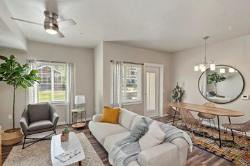 Eagle apartment for rent - a living room with a couch and a table