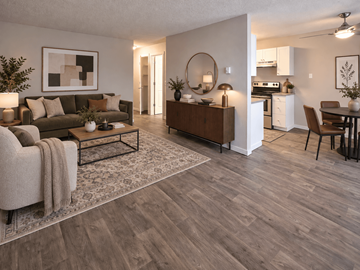 Portland apartment for rent - A living room with a brown coffee table and a grey rug.