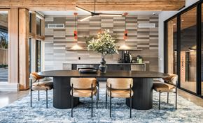Seattle apartment for rent - A modern dining room with a large table and chairs.