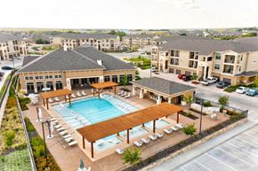 Leander apartment for rent - The Southbrook Apartments in Leander, Texas Exterior and Pool with Lounge Chairs