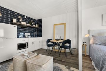 Richland apartment for rent - a living room with a couch and a table with chairs