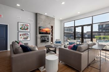 Spacious clubhouse with pool table, tv's, fireplace & conversational seating