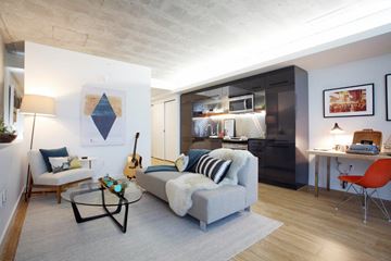 Portland apartment for rent - a living room with a couch and a table