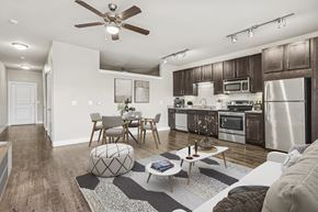 Midland apartment for rent - A modern kitchen with a dining table and chairs.