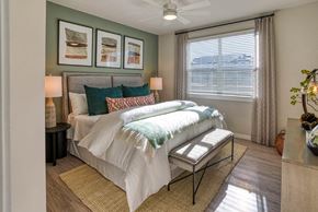 Surprise apartment for rent - a bedroom with a bed and a window