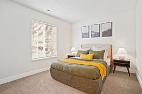Salt Lake City apartment for rent - a bedroom with a bed and a window
