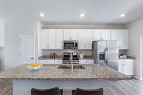 White Plains apartment for rent - A kitchen with granite countertops and stainless steel appliances.