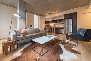 Bellevue apartment for rent - Alley 111 Luxury Apartments in Bellevue, Washington Model Living Room and Kitchen