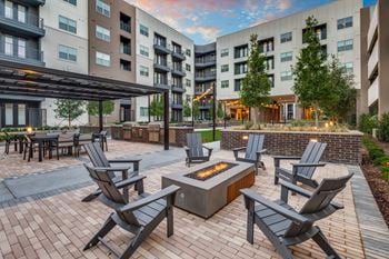 Outdoor pool lounge with outdoor gas grills, and fire pit