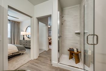 Custom tiled shower surrounds with glass door*