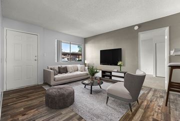Phoenix apartment for rent - our apartments offer a living room with a couch and a tv