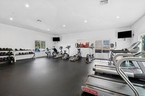 Flagstaff apartment for rent - A gym with treadmills, exercise bikes, and other equipment.