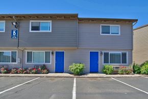 Vancouver apartment for rent - Exterior shot of blue front doors at at Block 88 Townhomes in the Hazel Dell neighborhood in Vancouver, Washington.