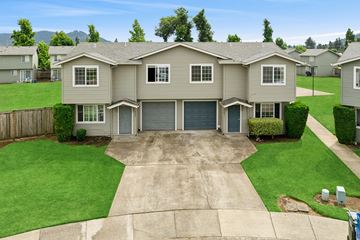 Springfield apartment for rent - A house with a grey roof and a grey garage door.