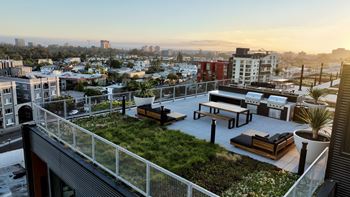 Rooftop terrace with skyline views + bbq stations