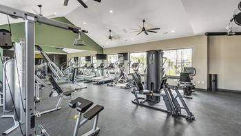 24/7 Fitness center fully equipped with free weights and top of the line machines