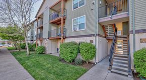 Eugene apartment for rent - Apartment building with a staircase leading to the second floor.