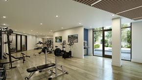 Lakeway apartment for rent - A gym with a variety of equipment including weights and cardio machines.
