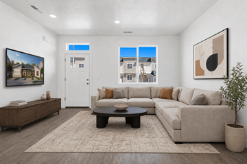 Richland townhouse for rent - A living room with a couch, coffee table, and a painting on the wall.
