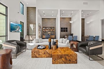 Allen apartment for rent - A modern living room with a wooden coffee table in the center.