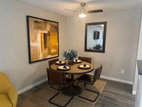 Santa Rosa apartment for rent - a dining room with a table and chairs